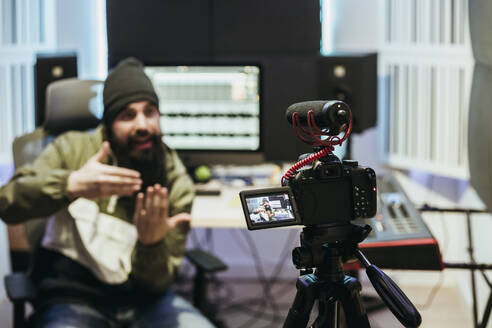 Dj making a video tutorial in his studio - XLGF00419