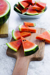 Chopped watermelon on chopping board - GIOF08657