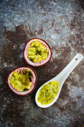 Passion fruit on spoon - GIOF08668