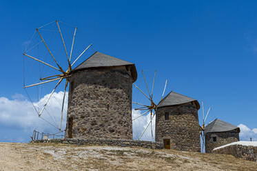 Greece, South Aegean, Patmos, Ancient stone windmills - RUNF04058