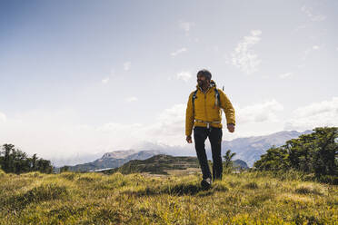 Man hiking on mountain at Patagonia, Argentina, South America - UUF20809