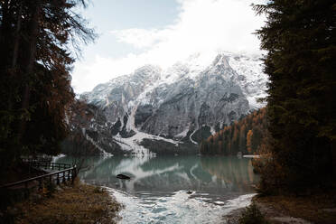 Idyllic landscape lake in snowy Dolomites mountains in Italy - ADSF10410
