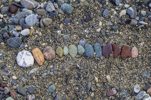 Close-up of pebbles on land at Greece - MAMF01282