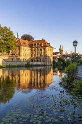 Germany, Bavaria, Bamberg, Villa Concordia reflecting in river Regnitz - WDF06158