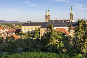 Germany, Bavaria, Bamberg, Bamberg Cathedral and surrounding old town buildings at dusk - WDF06162