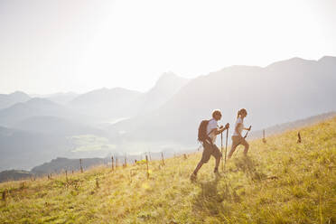 Couple hiking in the mountains, Achenkirch, Austria - DHEF00309