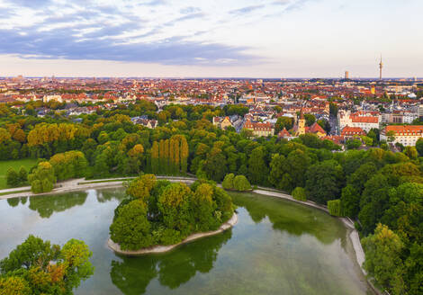 Germany, Bavaria, Munich, Drone view of Kleinhesseloher See and Electors Island in English Garden at dawn - SIEF09996