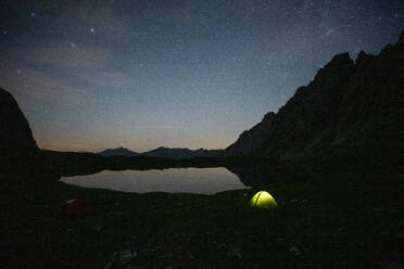 Tent at Lake Kogelsee at night, Tyrol, Austria - MALF00112