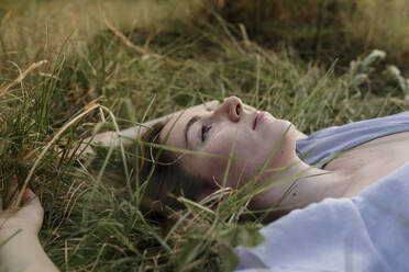 Beautiful woman relaxing on grass - DSIF00089