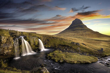 Sunrise at Kirkjufell Mountain overlooking a small waterfall, Iceland, Polar Regions - RHPLF17449