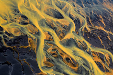 Colorful glacier rivers on the south coast of Iceland with black sand - CAVF88511