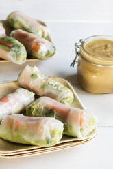 Spring rolls with jar of peanut dip - EVGF03661