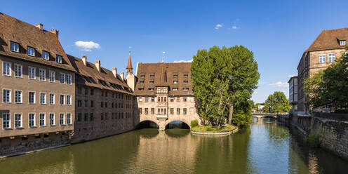 Germany, Bavaria, Nuremberg, Panorama of river Pegnitz and Holy Spirit Hospital - WDF06220