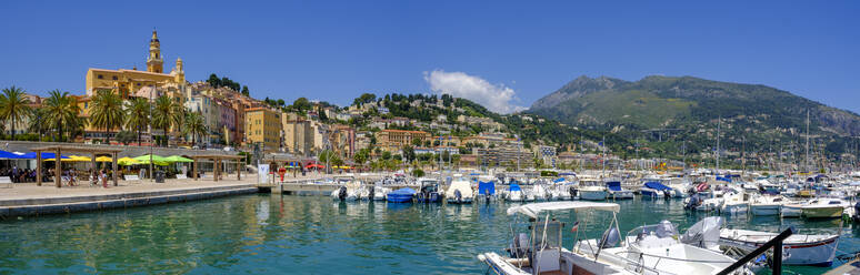 France, Provence-Alpes-Cote dAzur, Menton, Motorboats moored in harbor of coastal town in summer - LBF03183