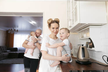 Happy family in kitchen - EYAF01292