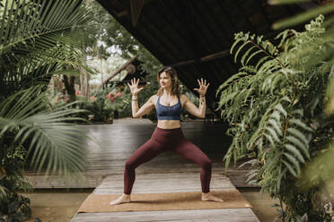 Woman practicing yoga - SMSF00186