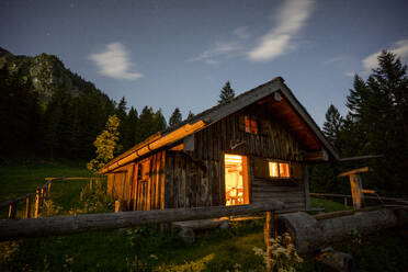Secluded mountain hut at dusk - MALF00158