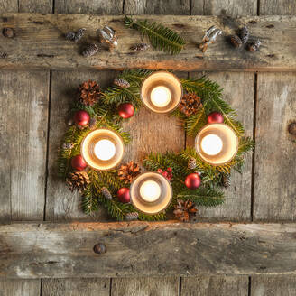 Four candles burning on Advent wreath - EVGF03705