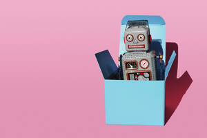 Studio shot of vintage robot toy in turquoise gift box - GEMF04102