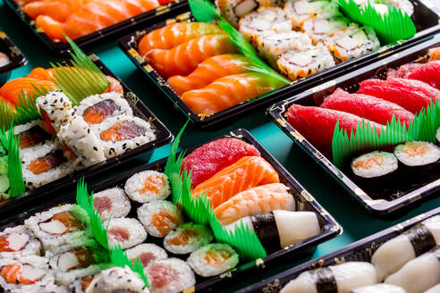 Appetizing delicious colorful sushi served table in restaurant - ADSF14205