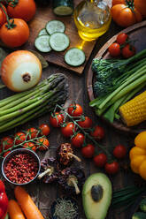 Variety of fresh healthy food consisting of tasty fresh vegetables berries and herbs on wooden rustic table - ADSF14207