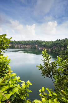 France, Wallis and Futuna, Bay surrounded by forested cliffs - RUNF04165