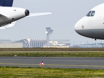 Airplanes on runway at airport - WEF00470