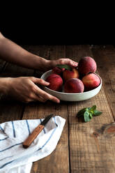 Tasty ripe peaches in plate - ADSF14513