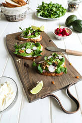 Vegetarian sandwiches on cutting board - ADSF14525