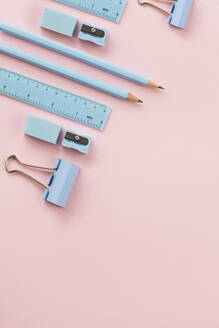 Studio shot of pastel blue school supplies - MOMF00912