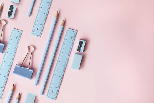 Studio shot of pastel blue school supplies - MOMF00913