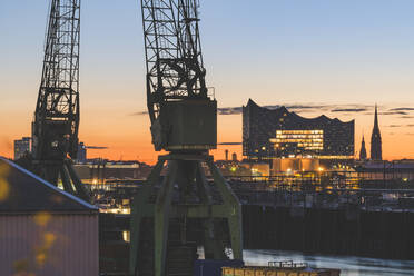 Germany, Hamburg, Argentina Bridge with Elbphilharmonie at sunrise - KEBF01683