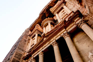 Looking up at the Treasury in the ancient city of Petra, Jordan - CAVF88976