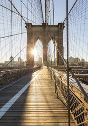 USA, New York, New York City, Brooklyn Bridge at sunrise - AHF00018