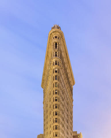 USA, New York, New York City, Flatiron Building against clear sky stock photo