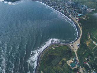 Russia, Primorsky Krai, Zarubino, Aerial view of town on shore of Sea of Japan - KNTF05320