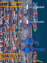 Russia, Primorsky Krai, Vladivostok, Aerial view of cargo containers in commercial dock - KNTF05388