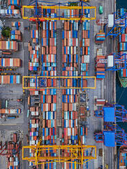 Russia, Primorsky Krai, Vladivostok, Aerial view of cargo containers in commercial dock - KNTF05389