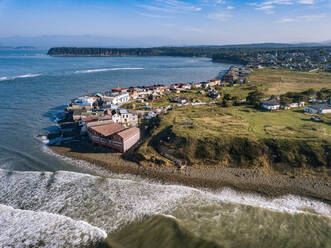 Russia, Primorsky Krai, Nakhodka, Aerial view of village on shore of Sea of Japan - KNTF05424