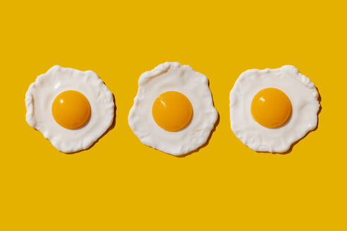 Studio shot of three fried eggs - GEMF04150