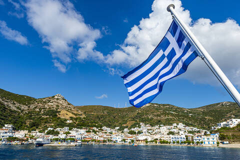 Greek flag in the Port of Kampi, Fourni (Fournoi), Greek Islands, Greece,  Europe stock photo