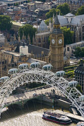 An aerial view of The London Eye and The Houses of Parliament, London, England, United Kingdom, Europe - RHPLF17731