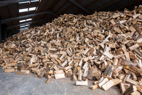 Large heap of firewood stock photo