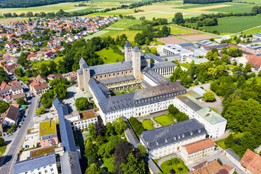 Aerial view of Munsterschwarzach Abbey in town during sunny day at Schwarzach, Bavaria, Germany - AMF08491