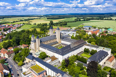 Drone view of Munsterschwarzach Abbey against sky at Schwarzach, Bavaria, Germany - AMF08493