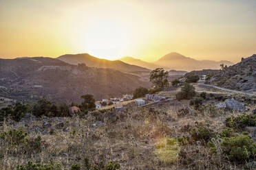 Greece, Crete, Lentas, Mountain village at summer sunset - MAMF01292