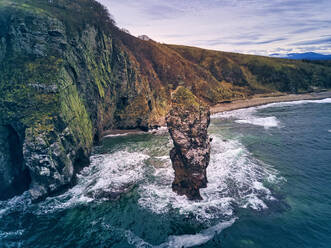 Cliff by sea of Japan against sky at Krabbe Peninsula, Primorsky Krai, Russia - KNTF05433