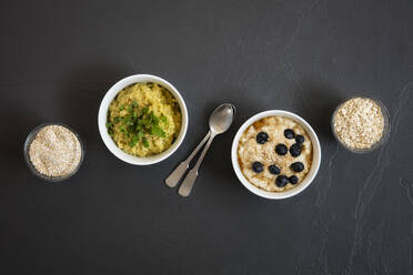 Two bowls of sweet and savory porridge with oats - EVGF03772