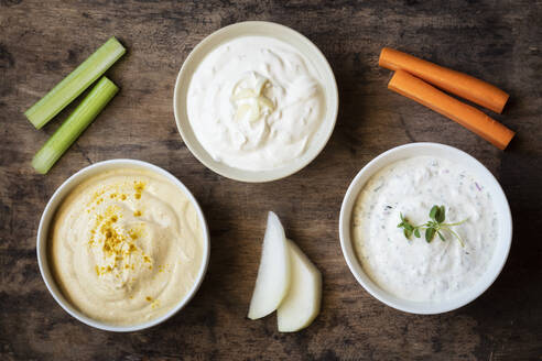 Variation of sour cream with vegetable stick kept on table - EVGF03807