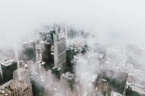 Aerial view highrise buildings in fog, Chicago, Illinois, USA - FSIF05170